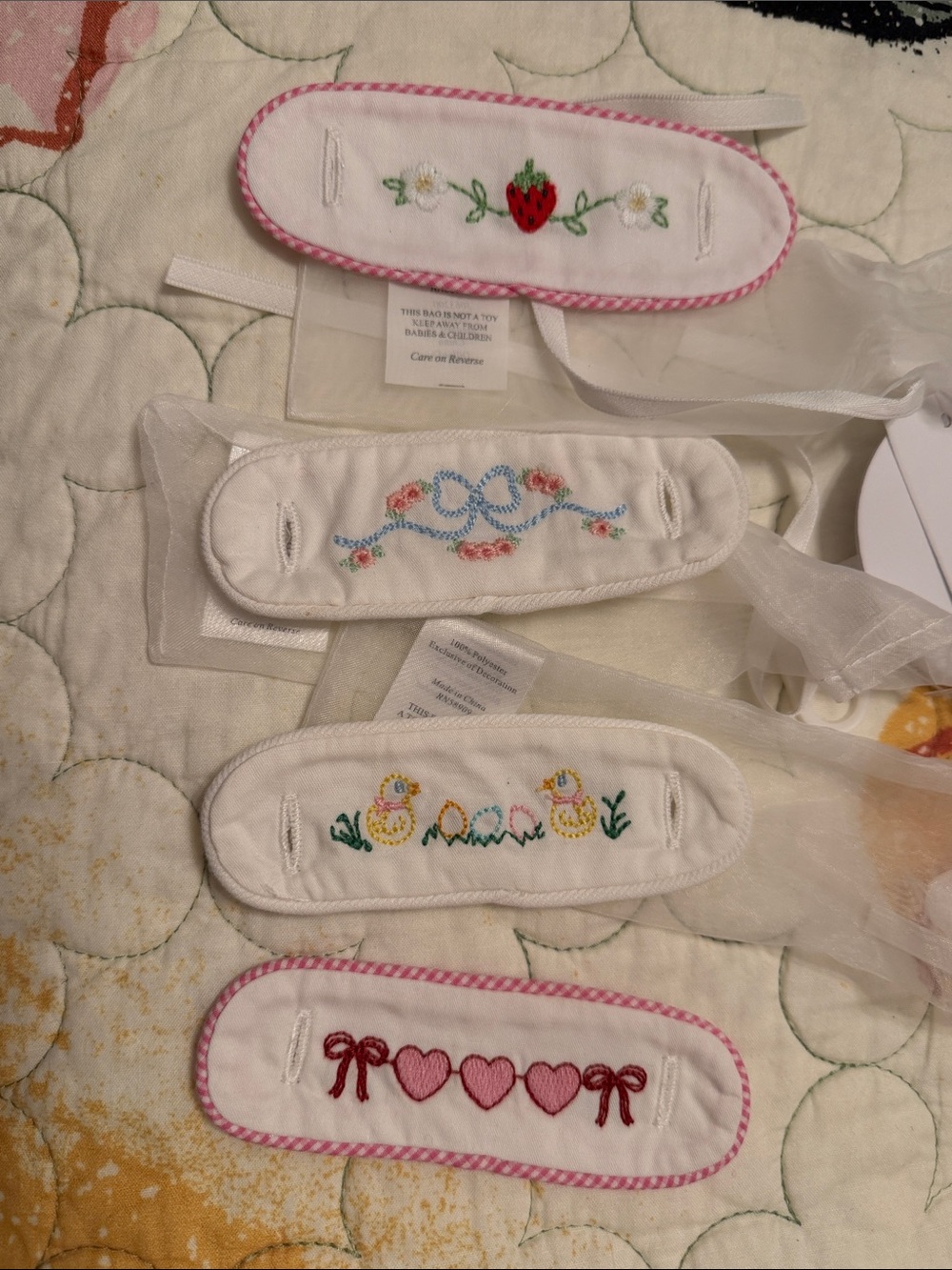 Embroidered clothing interchangeable tabs
